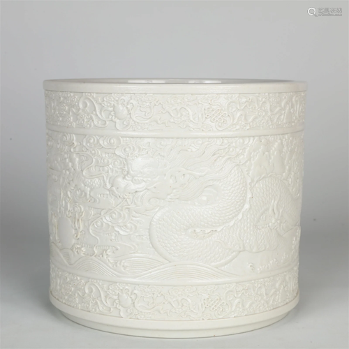 A White-Glazed 'Dragon' Brush Pot