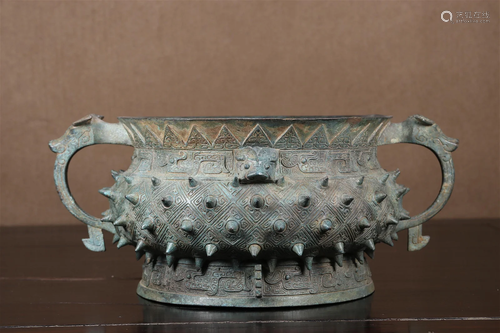 A Bronze 'Animal Mask' Basin