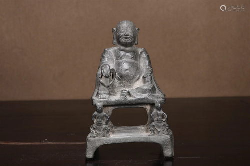 A Bronze Seated Figure