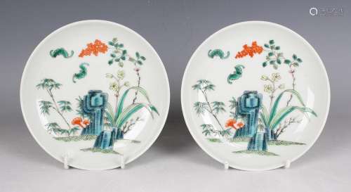 A pair of Chinese famille verte porcelain saucer dishes, mar...