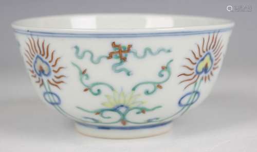 A Chinese doucai porcelain bowl, the exterior painted with a...