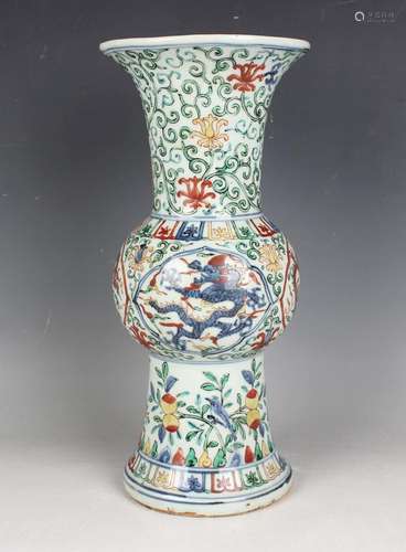 A Chinese wucai porcelain trumpet vase, mark of Wanli but pr...