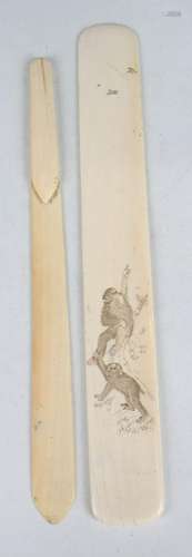 A Japanese ivory page turner, Meiji period, each side carved...