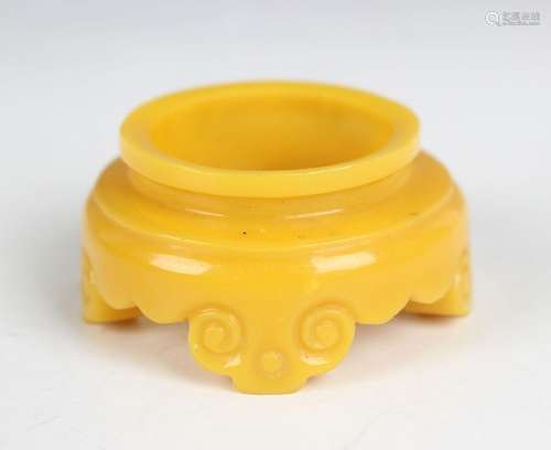 A Chinese yellow Peking glass circular stand, probably 19th ...