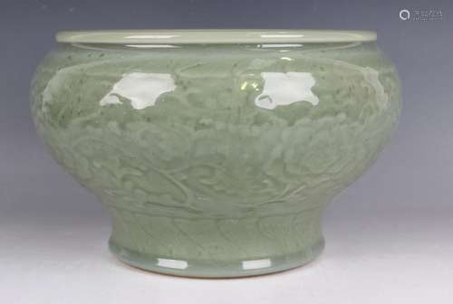 A Chinese celadon glazed porcelain bowl, mark of Yongzheng b...