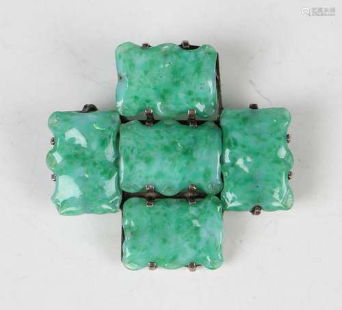 A Chinese apple green jade brooch with silver mounts, early ...