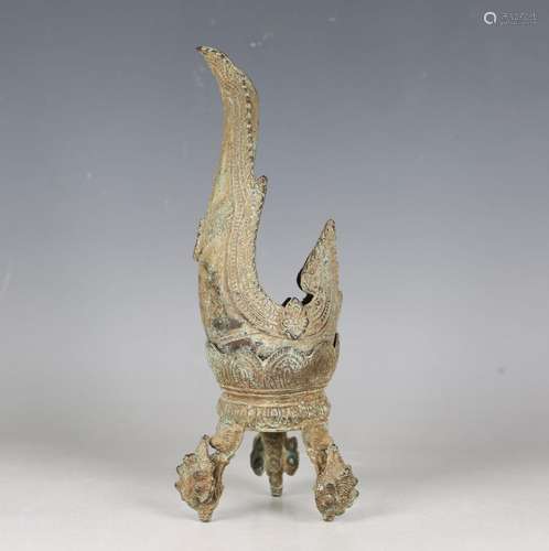 A Khmer verdigris bronze ritual conch shell water pourer and...