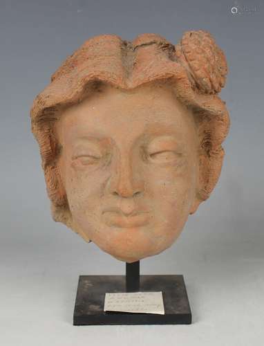 A Kashmir terracotta head of a saint, possibly 6th century, ...