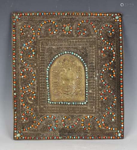 A Tibetan brass rectangular votive plaque, early 20th centur...