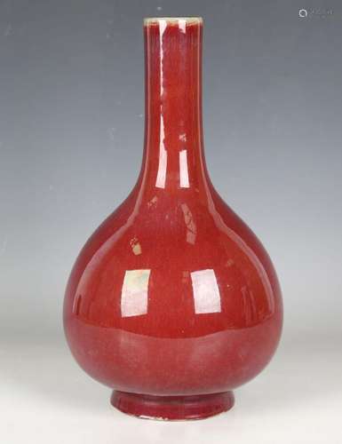 A Chinese sang-de-boeuf glazed bottle vase, mark of Qianlong...