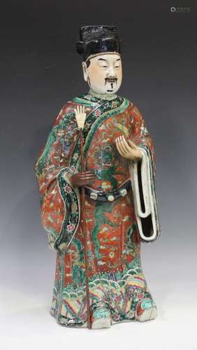 A Chinese famille verte enamelled porcelain figure of an imm...