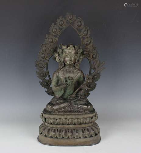 A Sino-Tibetan brown patinated bronze Buddha, Qing dynasty, ...