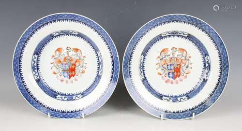 A pair of Chinese armorial export porcelain soup plates, pro...