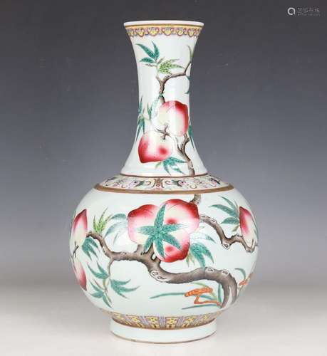 A Chinese famille rose porcelain bottle vase, mark of Guangx...