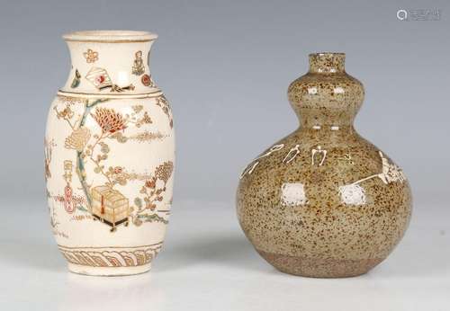 A Japanese Satsuma earthenware vase, Meiji period, the swoll...