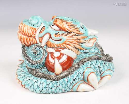 A Japanese Arita porcelain figure of a dragon, Meiji period,...