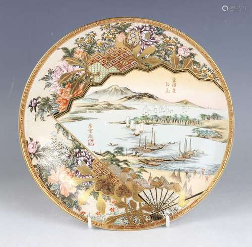 A Japanese Satsuma earthenware circular plate by Ryokuzan, p...