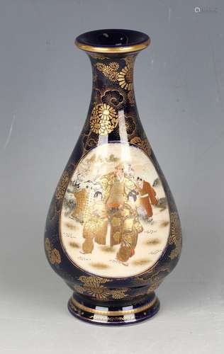 A Japanese Satsuma earthenware bottle vase by Kinkozan, Meij...