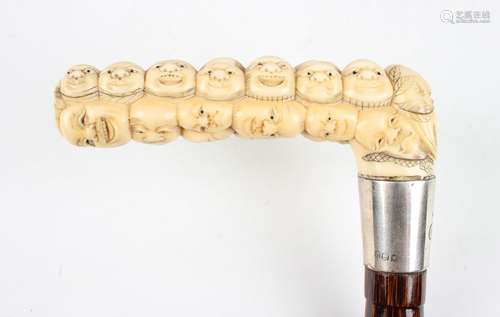 A Japanese ivory handled walking cane, Meiji period, the ivo...