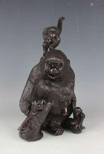 A Japanese dark brown patinated bronze monkey group, Meiji/T...