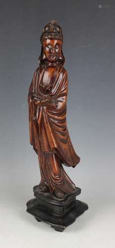 A Chinese carved wood figure of Guanyin, probably 17th/18th ...