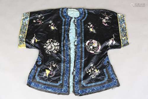 A Chinese black silk embroidered jacket/robe, early 20th cen...