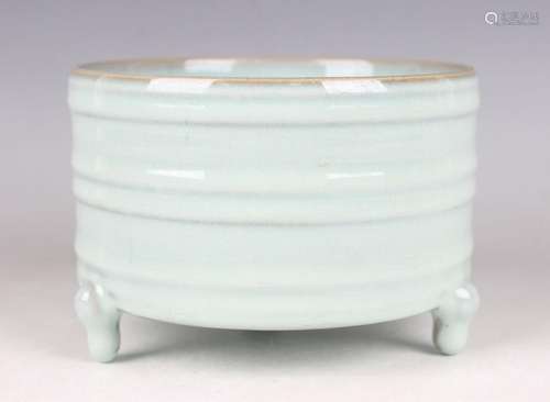 A Chinese pale blue glazed cylindrical tripod censer, Song d...