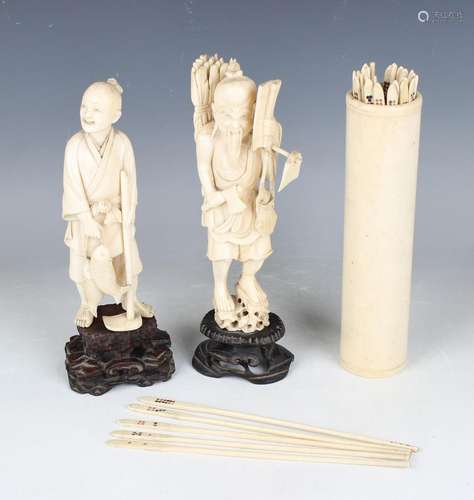 A Chinese carved ivory figure of a fisherman, late Qing dyna...