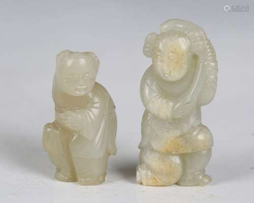 A group of three Chinese celadon jade pendant carvings of bo...