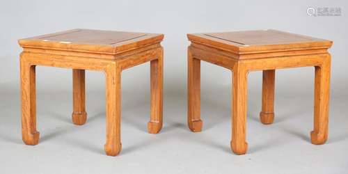 A pair of Chinese hardwood stands/tables, 20th century, each...