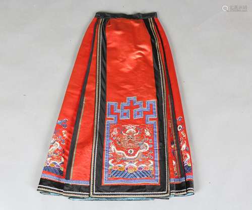 A Chinese red silk embroidered pleated apron skirt, late Qin...