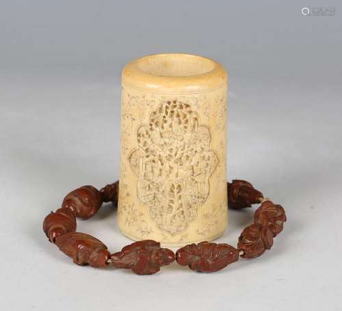 A string of ten Chinese carved coquilla nut beads, late Qing...