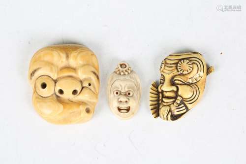 A Japanese carved ivory noh mask netsuke, Meiji period, mode...