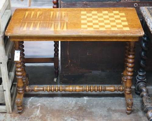 A Victorian inlaid rectangular walnut games table with chess...