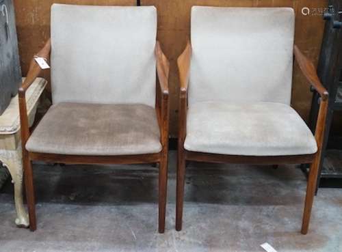 A pair of mid century teak upholstered elbow chairs, width 5...