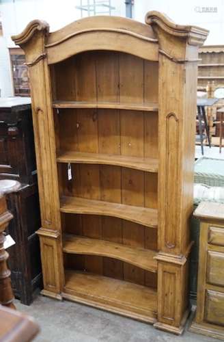 An 18th century style French provincial pine open bookcase, ...
