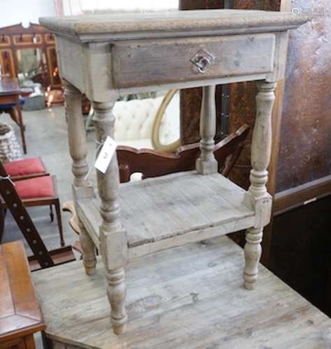 A 19th century style French provincial pine two tier side ta...