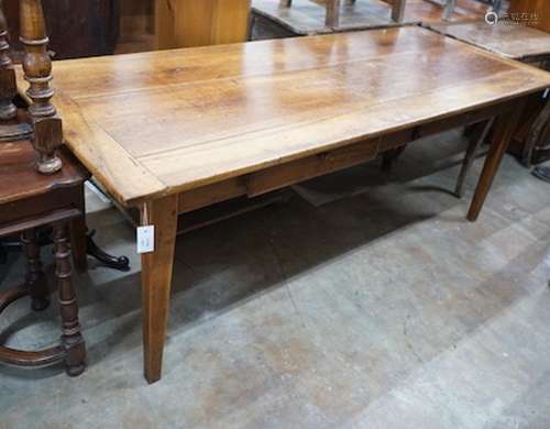 An early 19th century French rectangular fruitwood kitchen t...