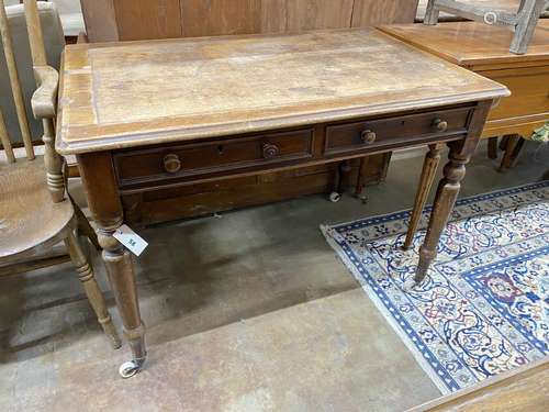 A Victorian mahogany two drawer writing table, width 106cm, ...