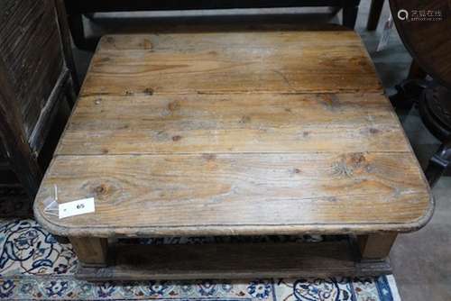 A French provincial rectangular pine coffee table, incorpora...