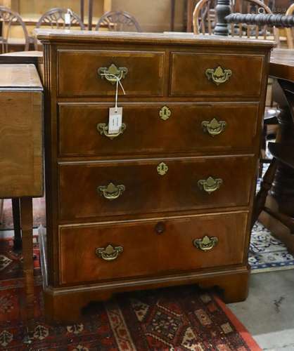 A George II style banded walnut television cabinet with dumm...