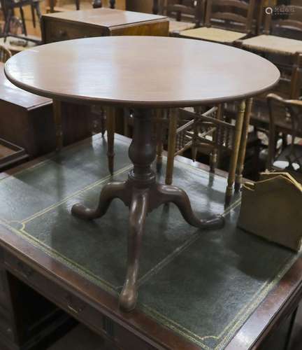 A George III circular mahogany birdcage tilt top tripod tea ...