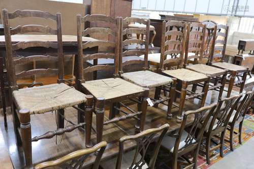 A set of six oak rush seat ladder back chairs