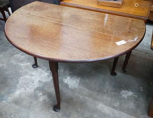 A George IIII mahogany oval drop leaf pad foot dining table,...