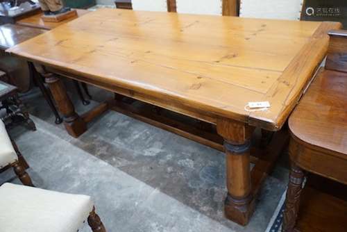 An 18th century style rectangular pine refectory dining tabl...