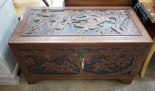 A Chinese carved camphorwood coffer, length 103cm, depth 52c...