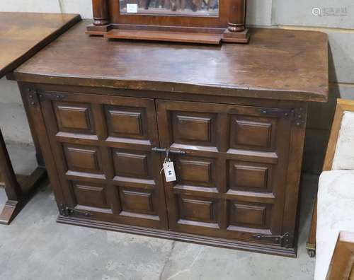 A Spanish panelled walnut two door cabinet, width 107cm, dep...