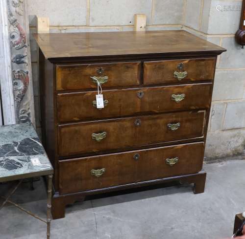 An 18th century and later banded walnut chest of drawers, wi...