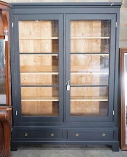 A French painted glazed pine two door bookcase, width 155cm,...