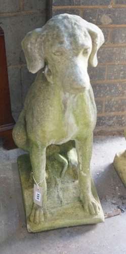A reconstituted stone seated hound garden ornament, height 7...